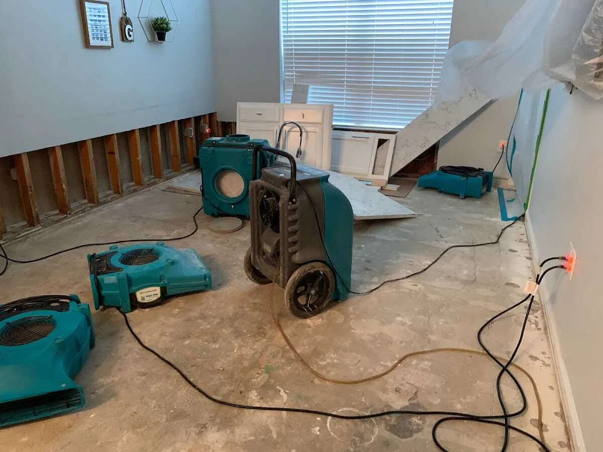 Dehumidifier in flood-cut room for Water Damage Restoration in Ranson corporation