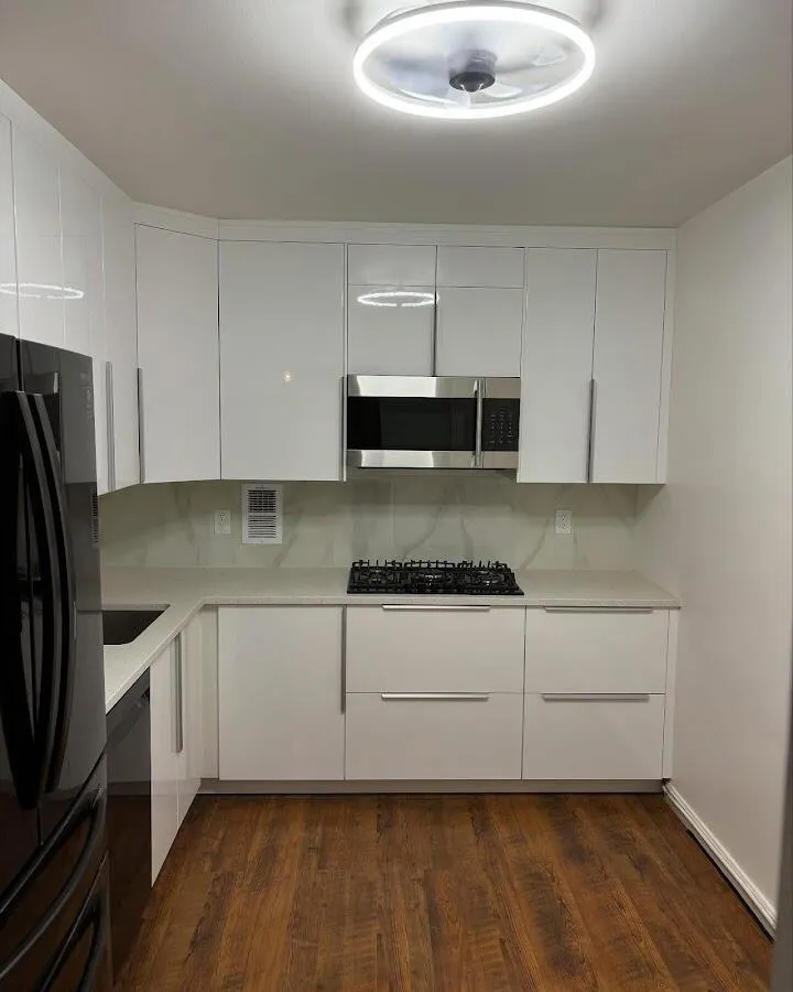Renovated kitchen with quartz countertops in Ranson corporation